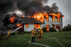 Fire,Fighters,Putting,Out,A,House,Fire